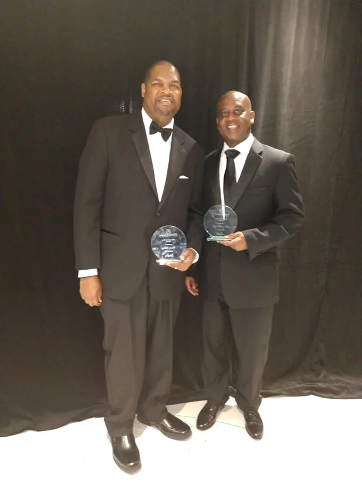 Charles Mallory photographed with Daytona Beach Mayor Derrick Henry who also received an award at the Emerald Ball
