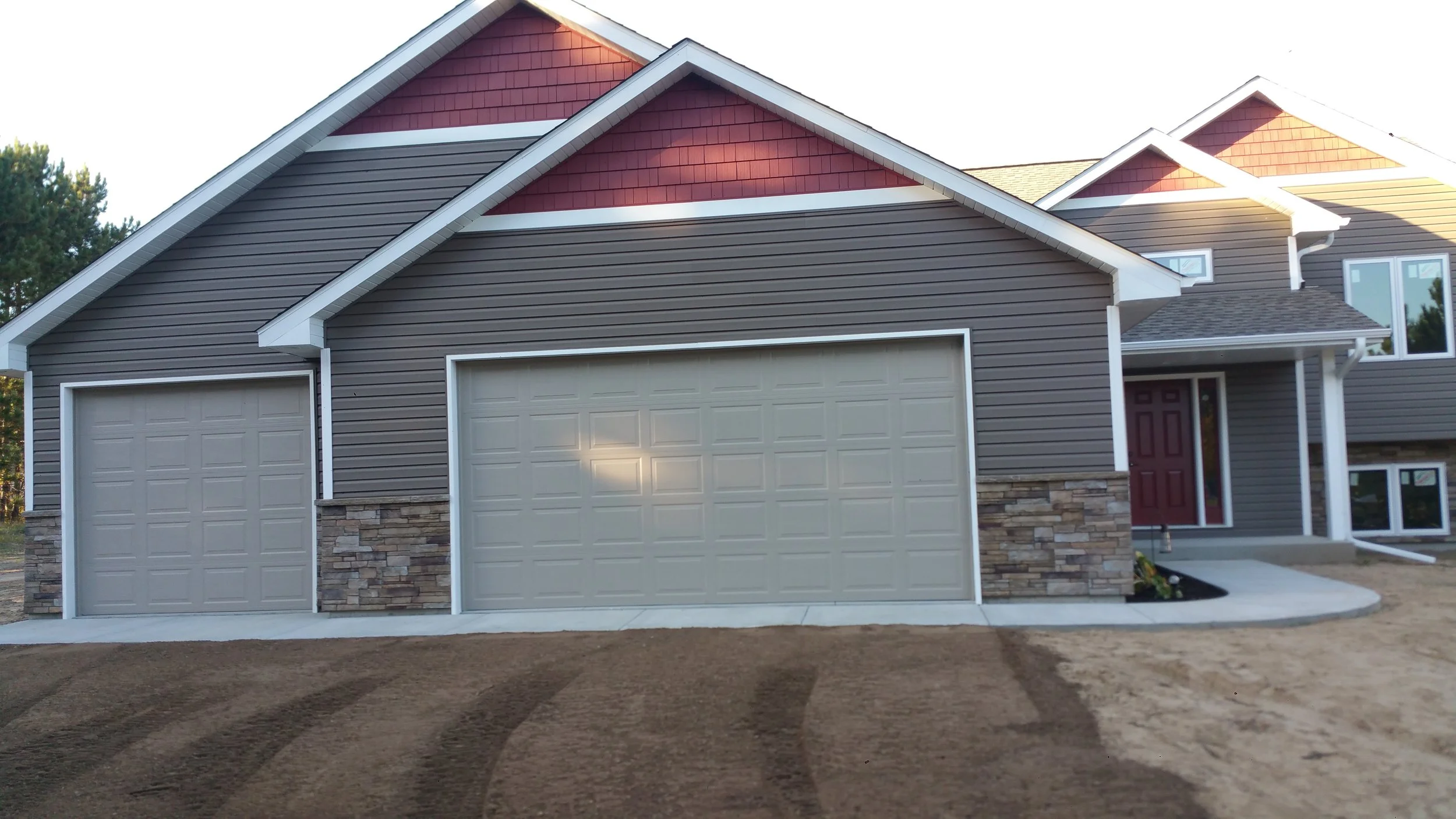 Bitz-exteriors-Ham-Lake-Siding-Shakes-soffits-stone-work-installation.jpg