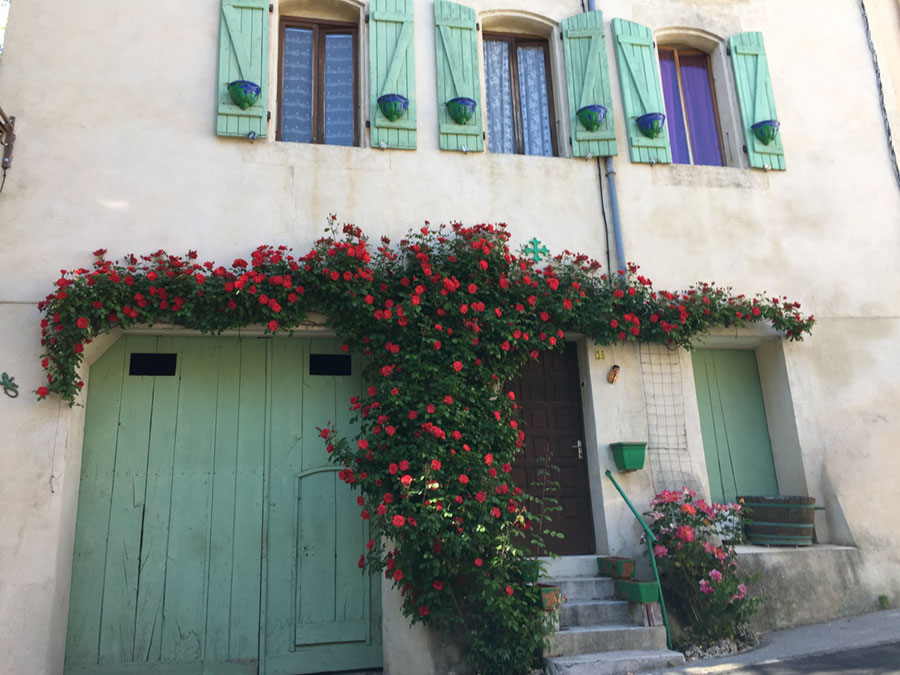 Down every street, you find stone homes lovingly softened by flowers