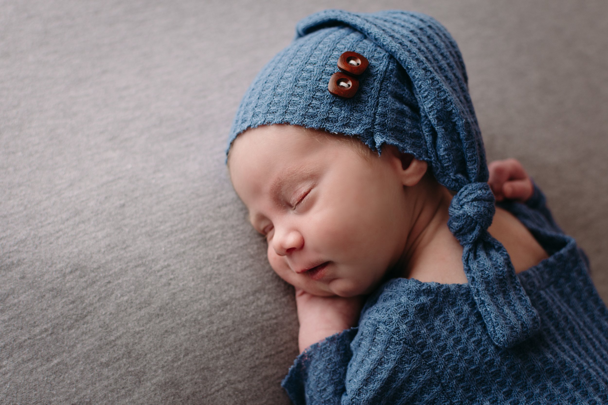 baby boy sleeping with hat