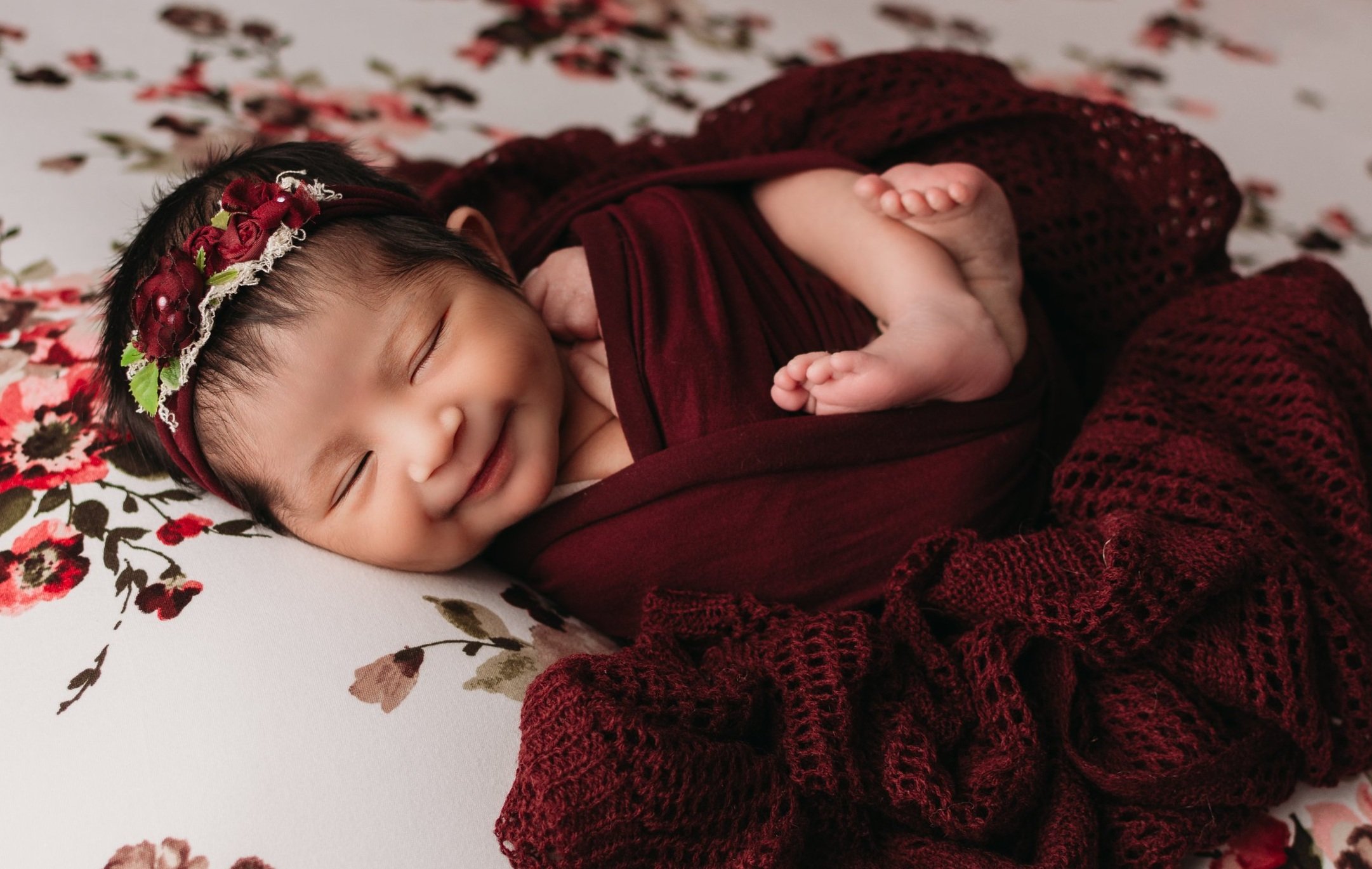 Newborn Photo baby girl in gray holding teddy