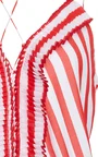 Detail view of red and white pleated trim