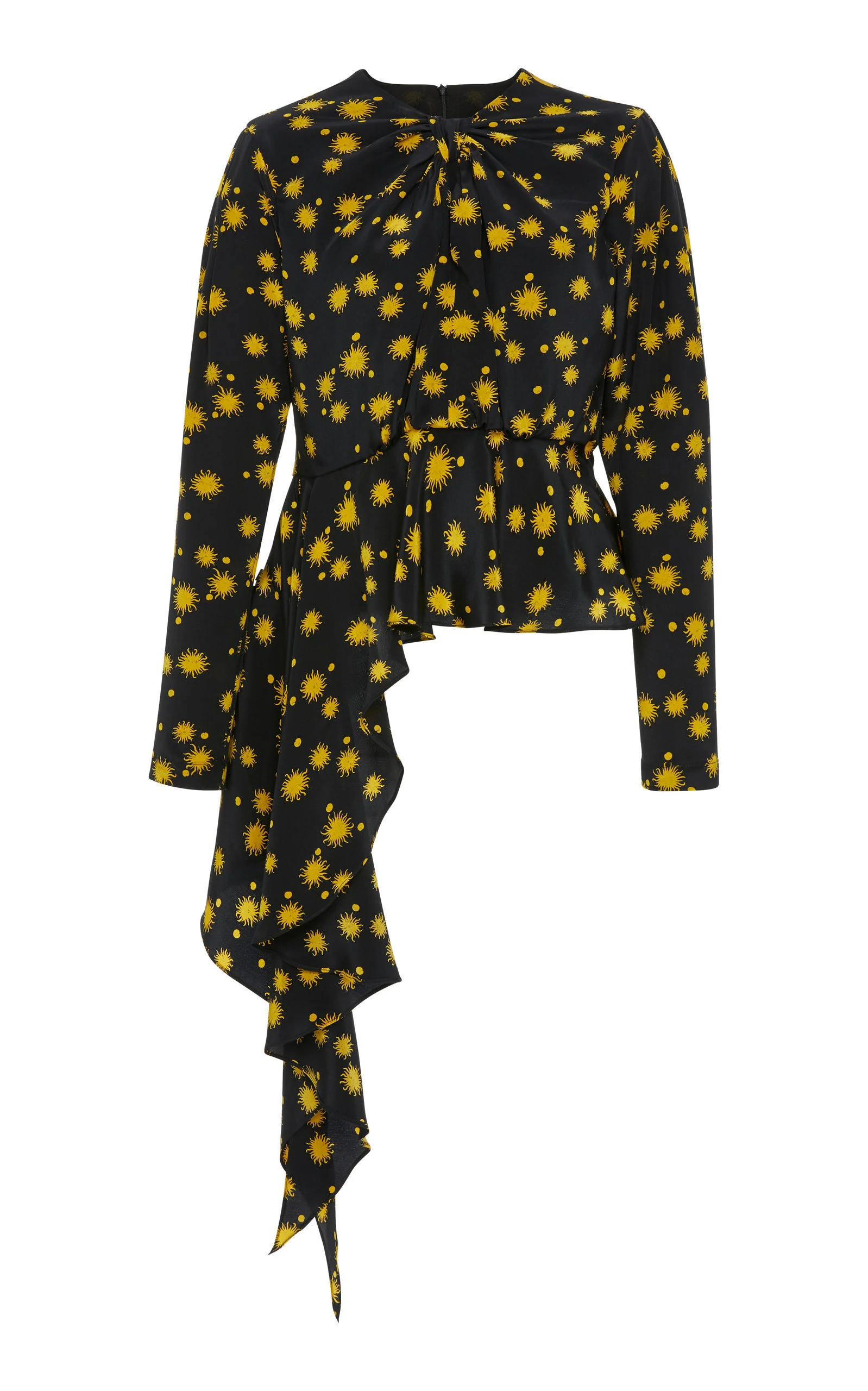 Back view of black long sleeve blouse with yellow star print and asymmetric draped hemline