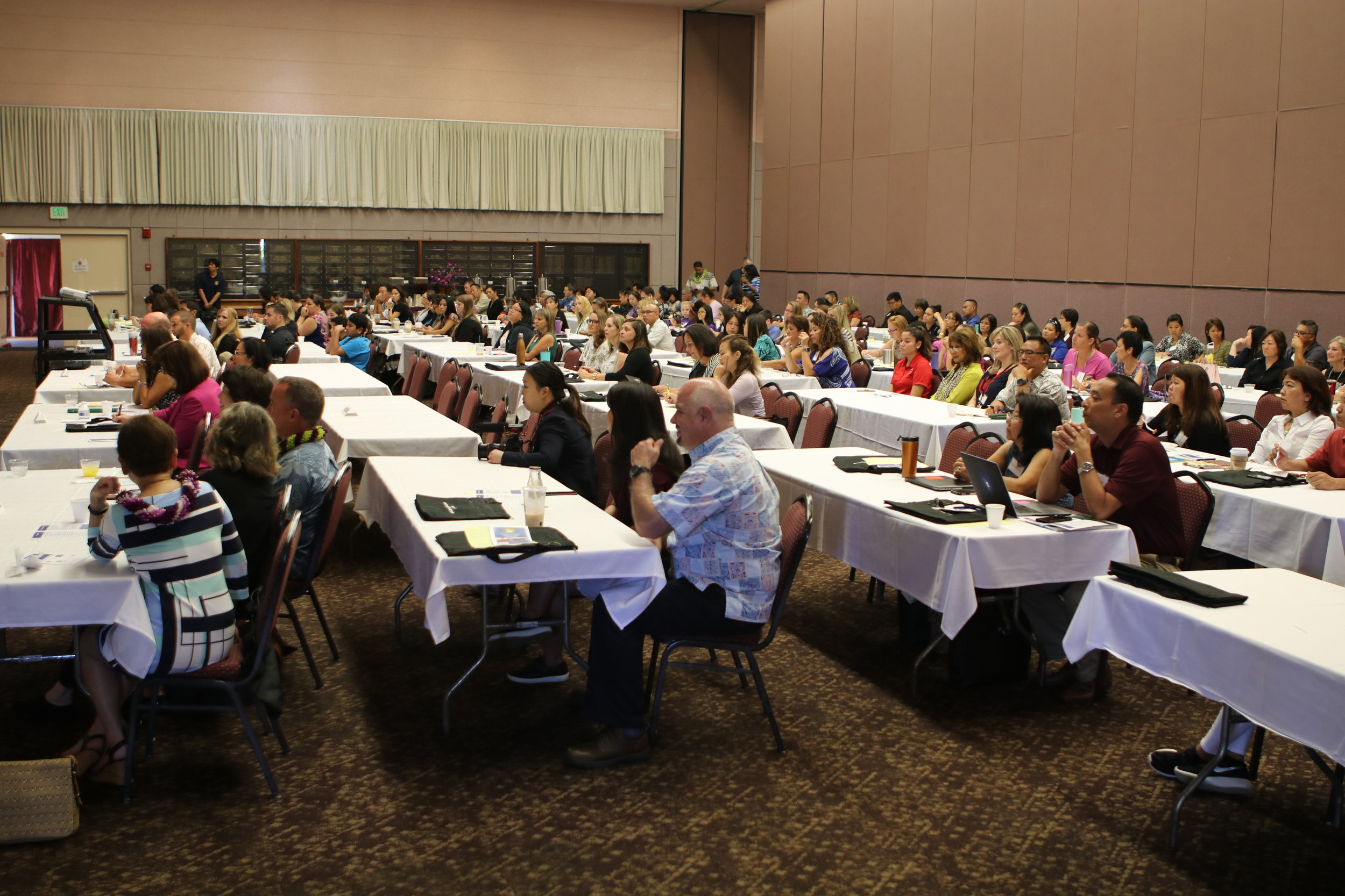 Educators from across the island engage in the history, overview, and reasons why transition centers were started.