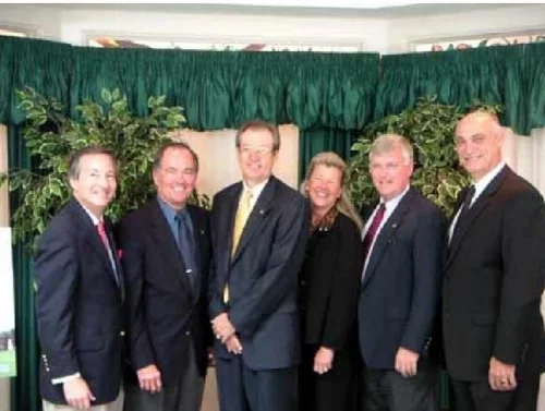 L to R: Stephen Feldman, president of the AMF; Bob Crippen, astronaut and AMF board member; Charles Geach, 2004 Alan Shepard Technology in Education Award winner; Laura Shepard Churchley, Alan Shepard’s daughter; James Kennedy, center director of the Kennedy Space Center; and Bob Henry, chairman of the AMF, corporate senior vice president of the Harris Corporation and president of the government communications systems division of the Harris Corporation on May 2, 2004.
