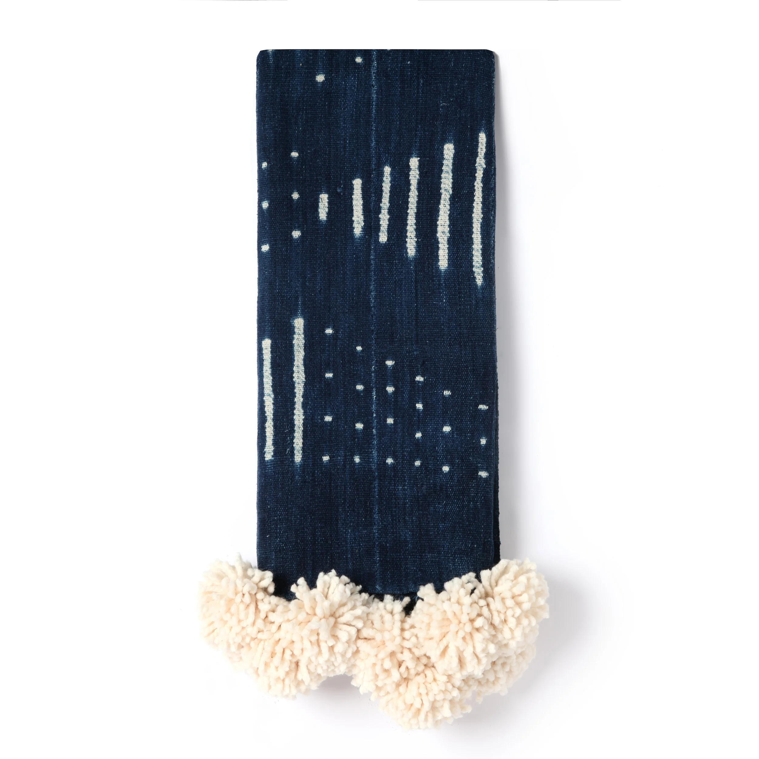 mudcloth pom pom throw - dark indigo + cream poms