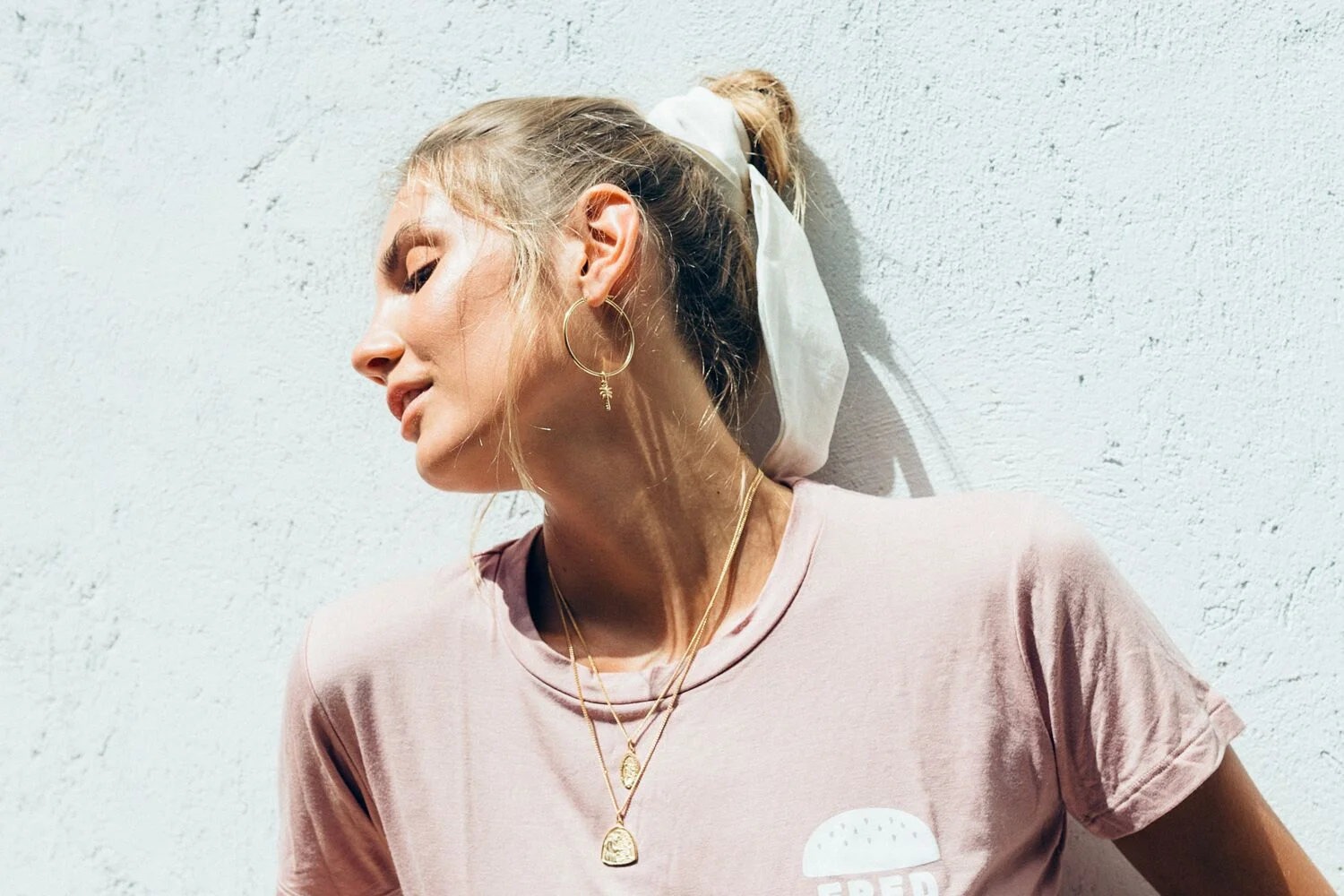 Necklaces from the Santa Chiara collection and Palm charm earring | PC: La Luna Rose