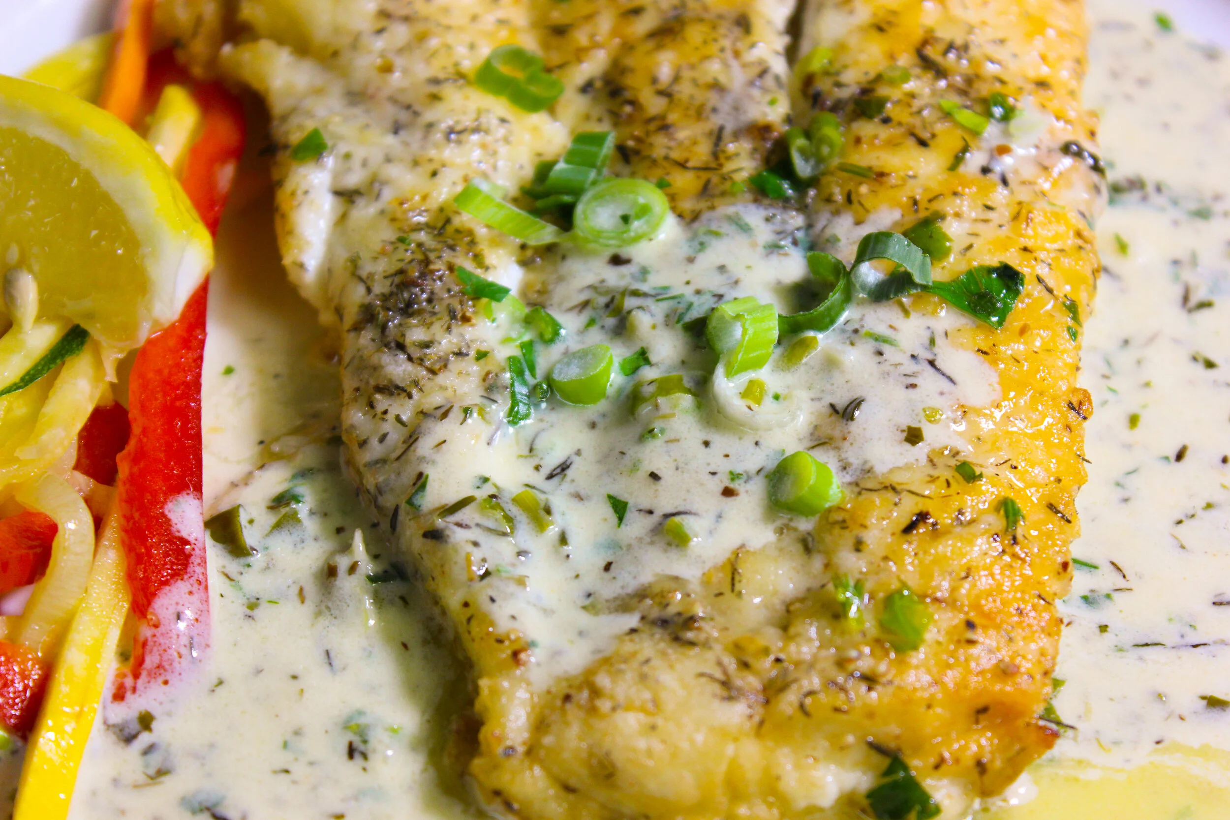 Fresh ALASKAN  " HALIBUT fillet " Light cream caper &amp; thyme sauce.