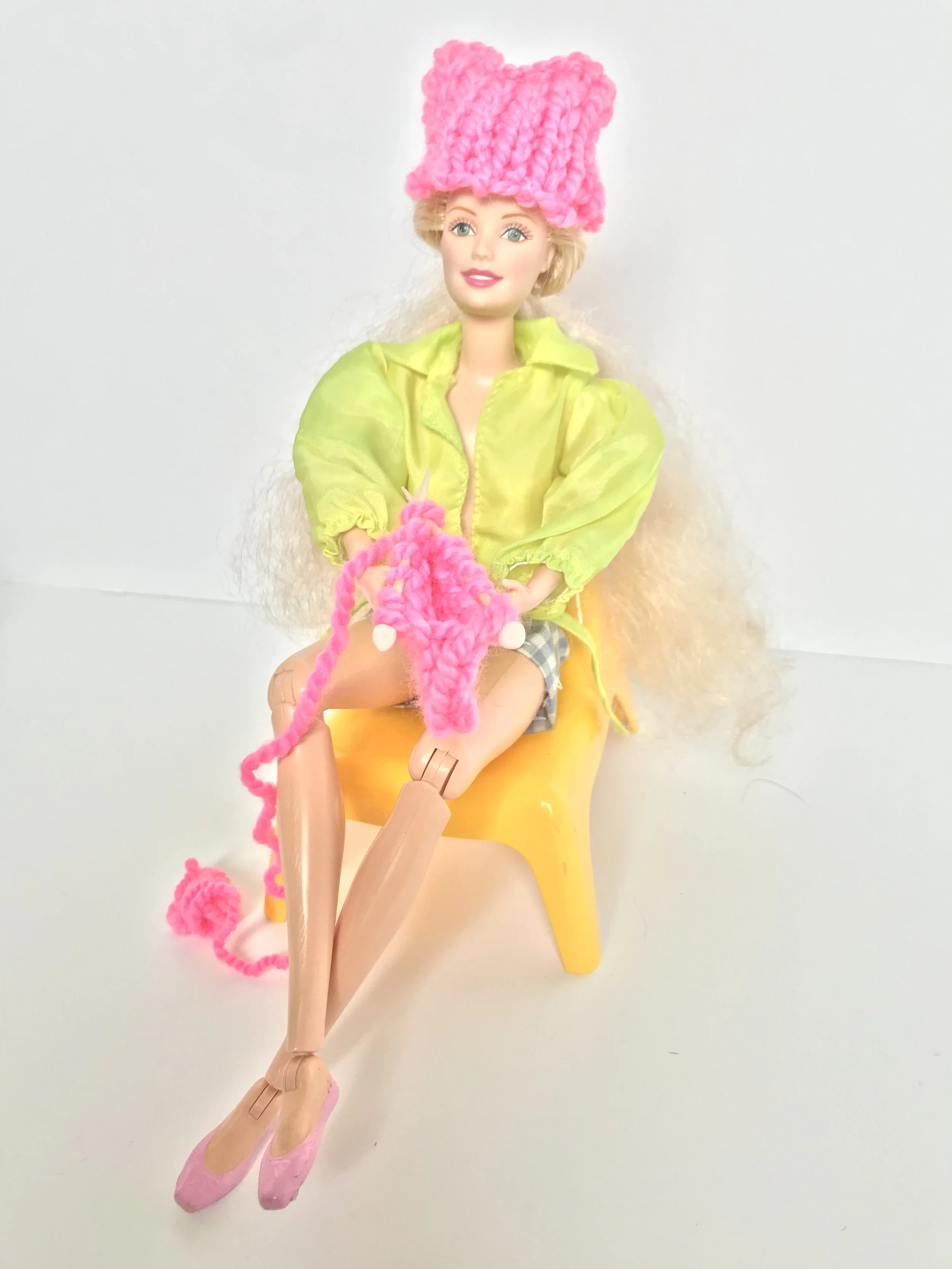Barbie Knits a Pussy Hat, 2019, Marsha Borden,