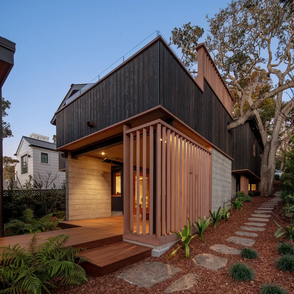 Exterior_of_the_Brisa_Home_in_Carmel_Showing_Hot_Tub_Area_With_Slatted_Wood_Privacy_Screens.webp