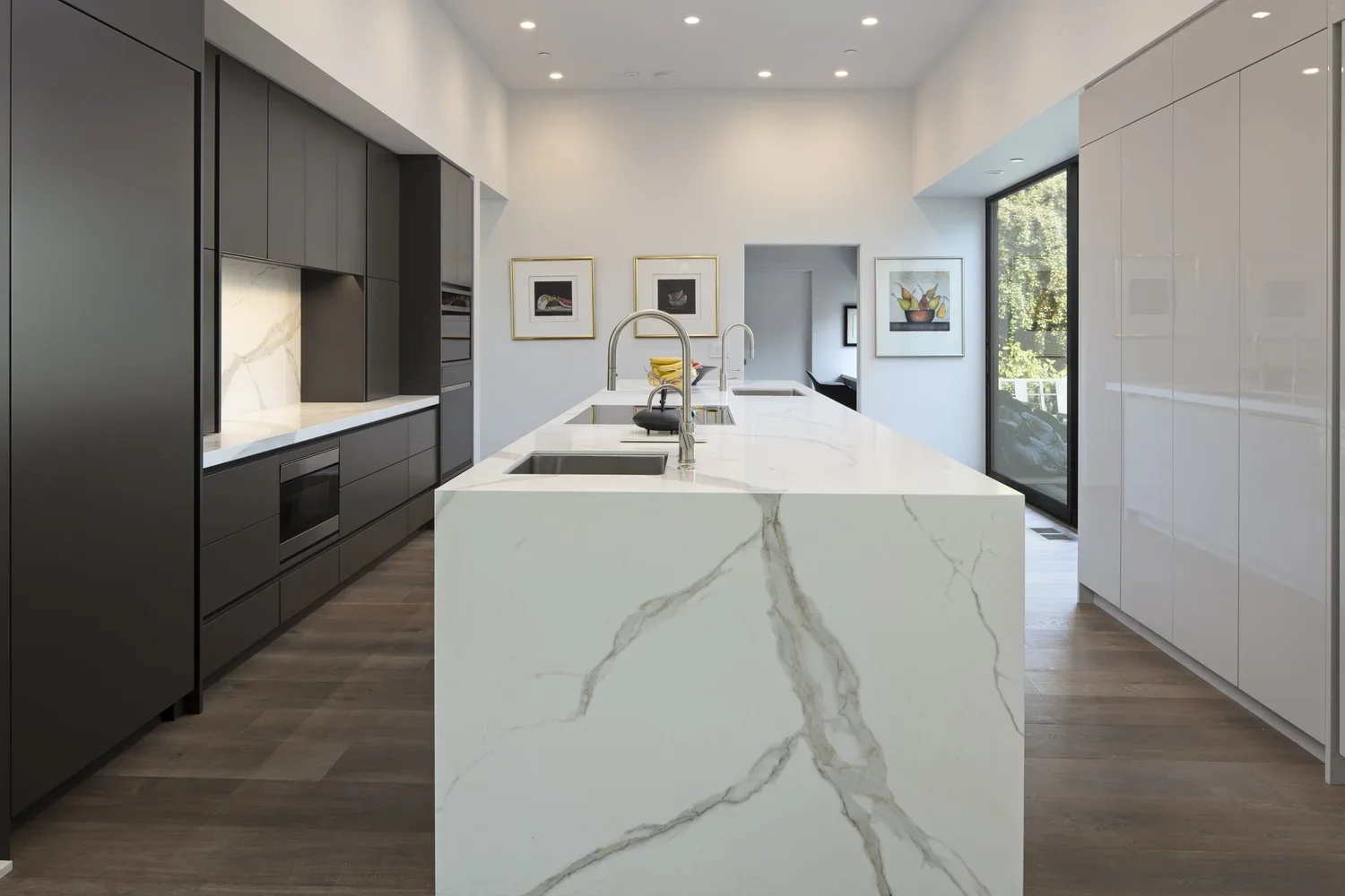 Interior_of_Pebble_Beach_Contemporary_House_Showing_Kitchen_With_Island_with_Sinks.webp