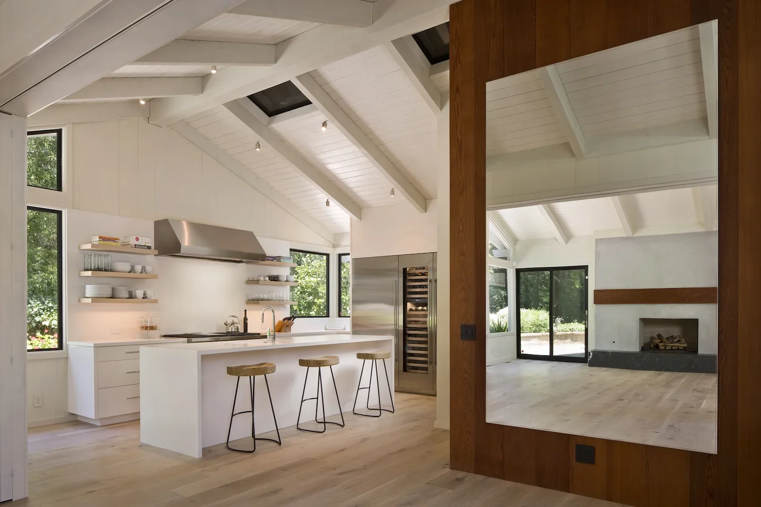 Interior_of_Quail_Carmel_House_Showing_Beautiful_Kitchen_Dining_Area_with_Wine_Cabinet.webp