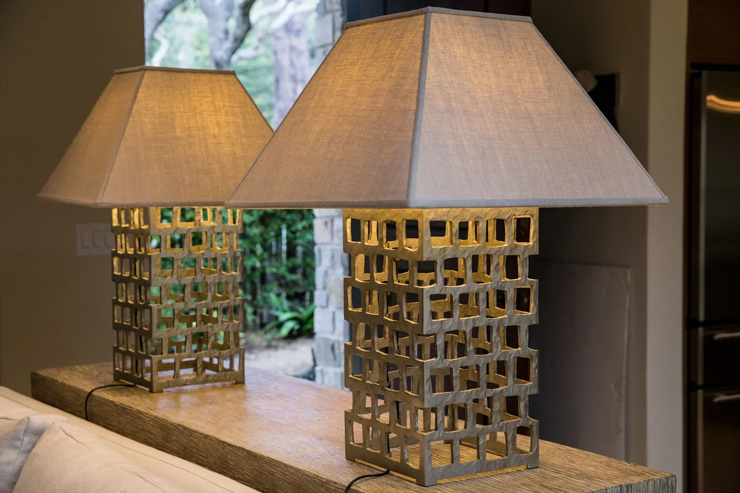 Interior_of_Carmel_By_The_Sea_House_Showing_Beautiful_Hollowed_Metal_Lamps.webp