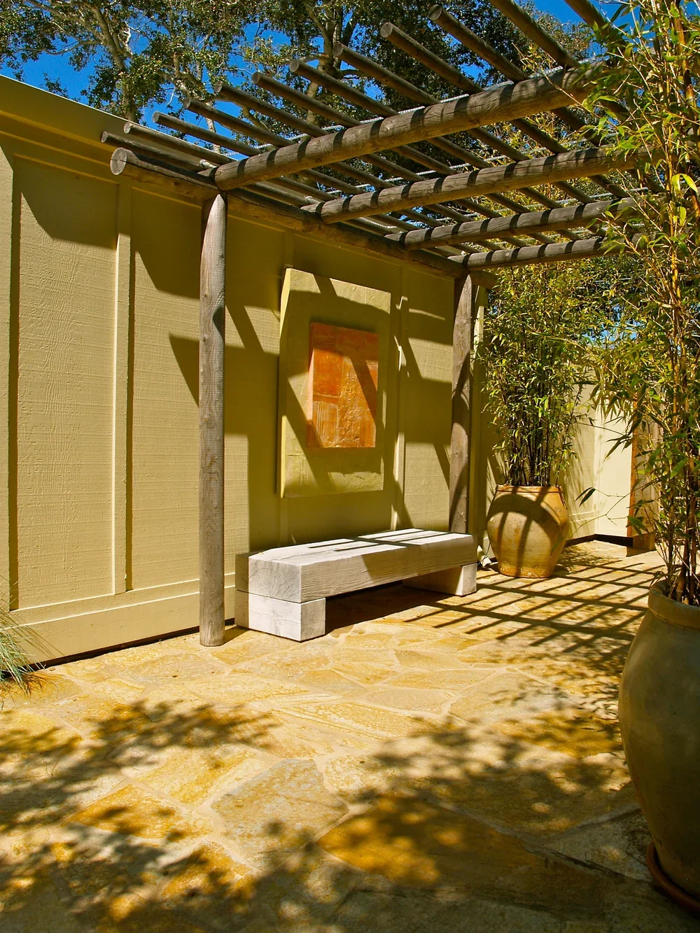 Exterior_of_Carmel_Valley_House_Showing_Outdoor_Bench_Meditation_Area.webp