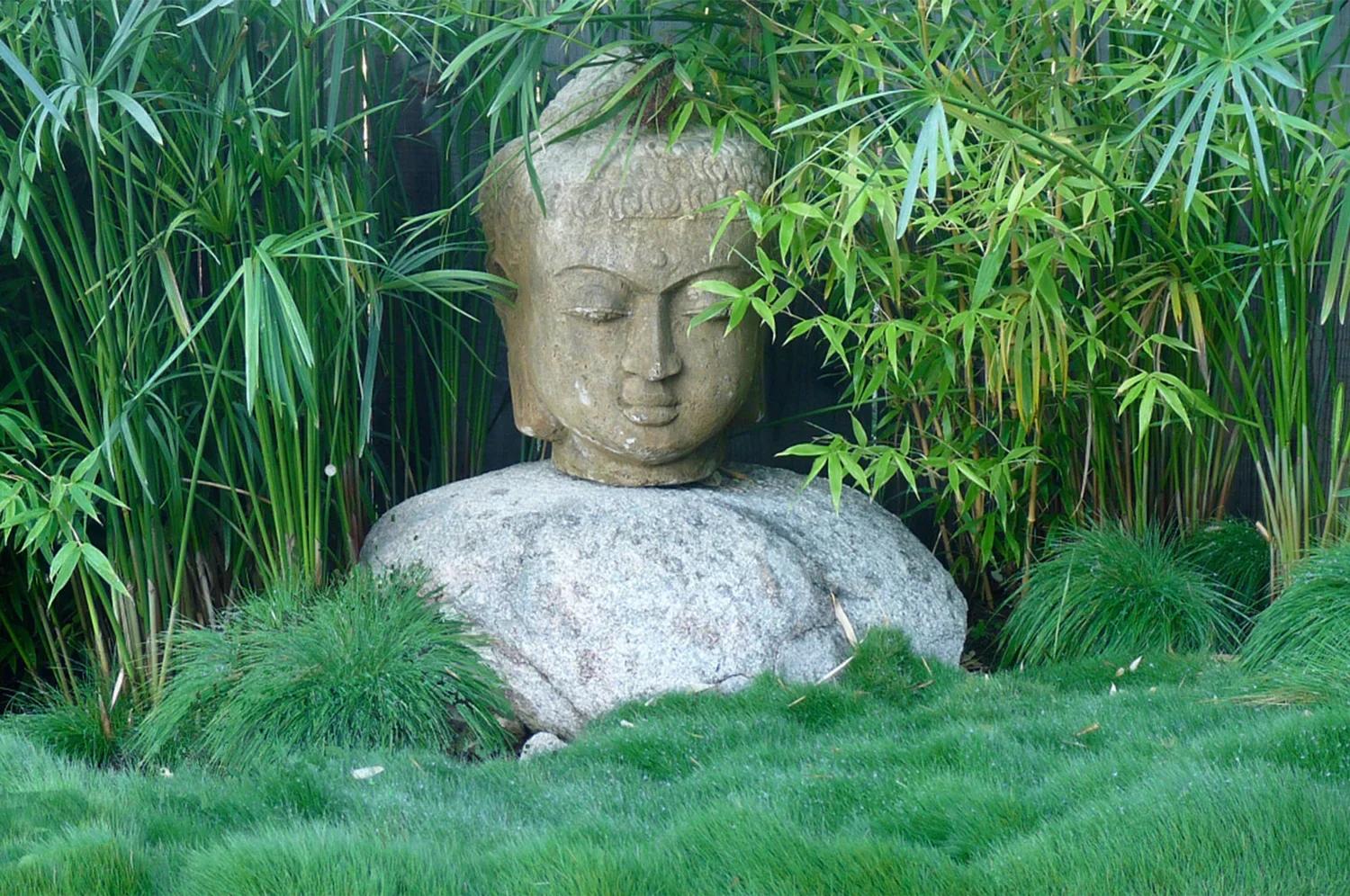 Exterior_of_Carmel_Valley_House_Showing_Outdoor_Sculpture_of_Buddha.webp