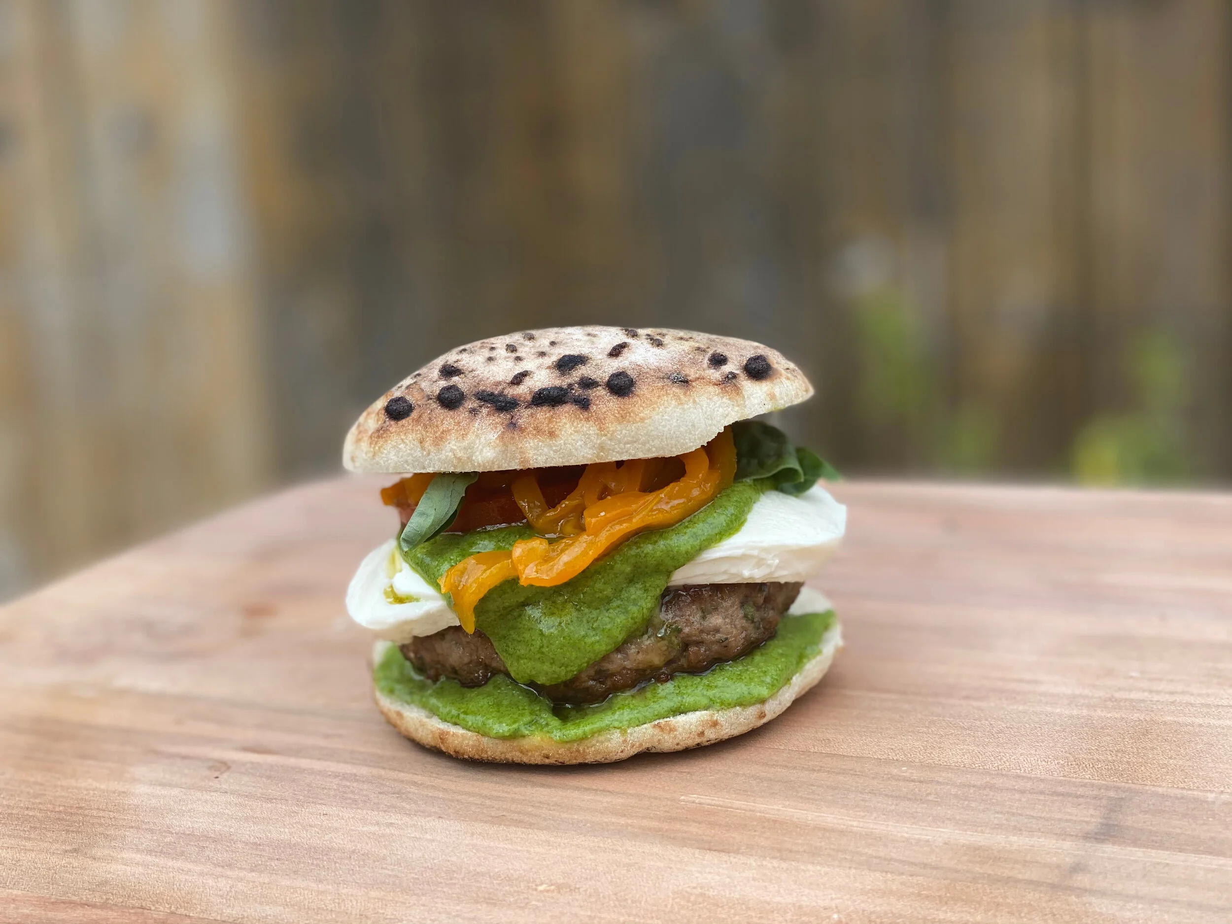 An inventive dish that merges the beloved elements of pizza and burgers, reflecting Chef Dominick's innovative approach to comfort food.