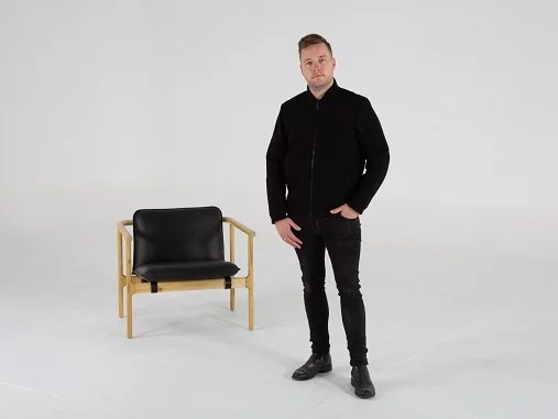 Tom Skeehan with the Hoshi Armchair available through Stylecraft