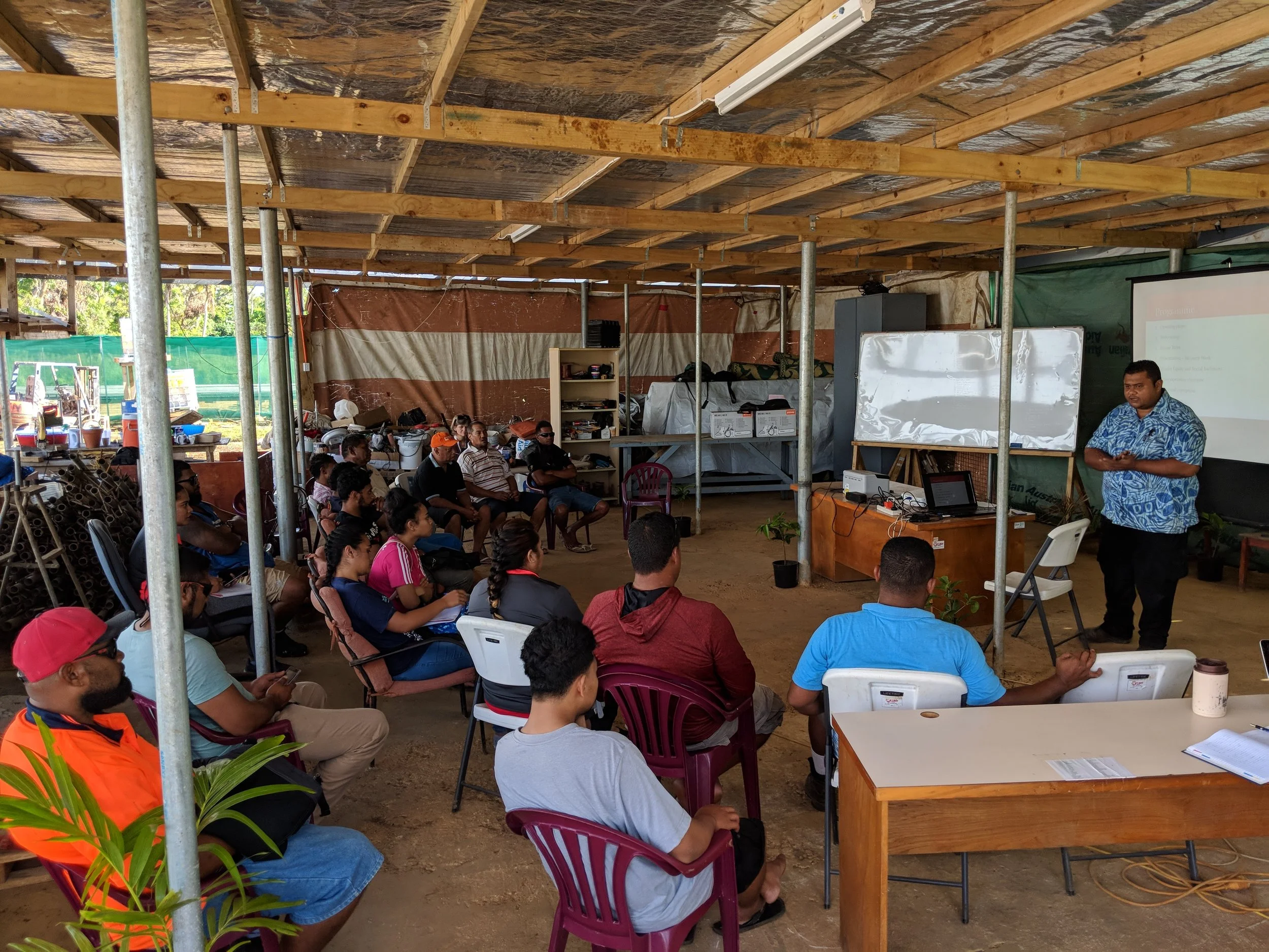 Photo caption: MORDI General Manager Soane Patolo providing training to field teams. Photo credit: CARE Australia. Date: May 2018.