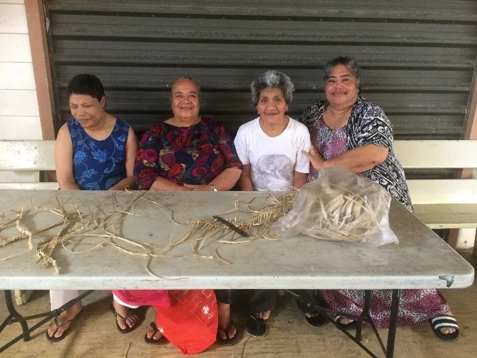 Above: Alonga Disability Centre (left to right) Kataloi Hoko (client), Sisilia Muimuiheatu (staff), Lavinia Fifita (client) and Oliveti Fungani (Manager) participating in a weaving activity. Photo: Charlie Damon, CARE Australia