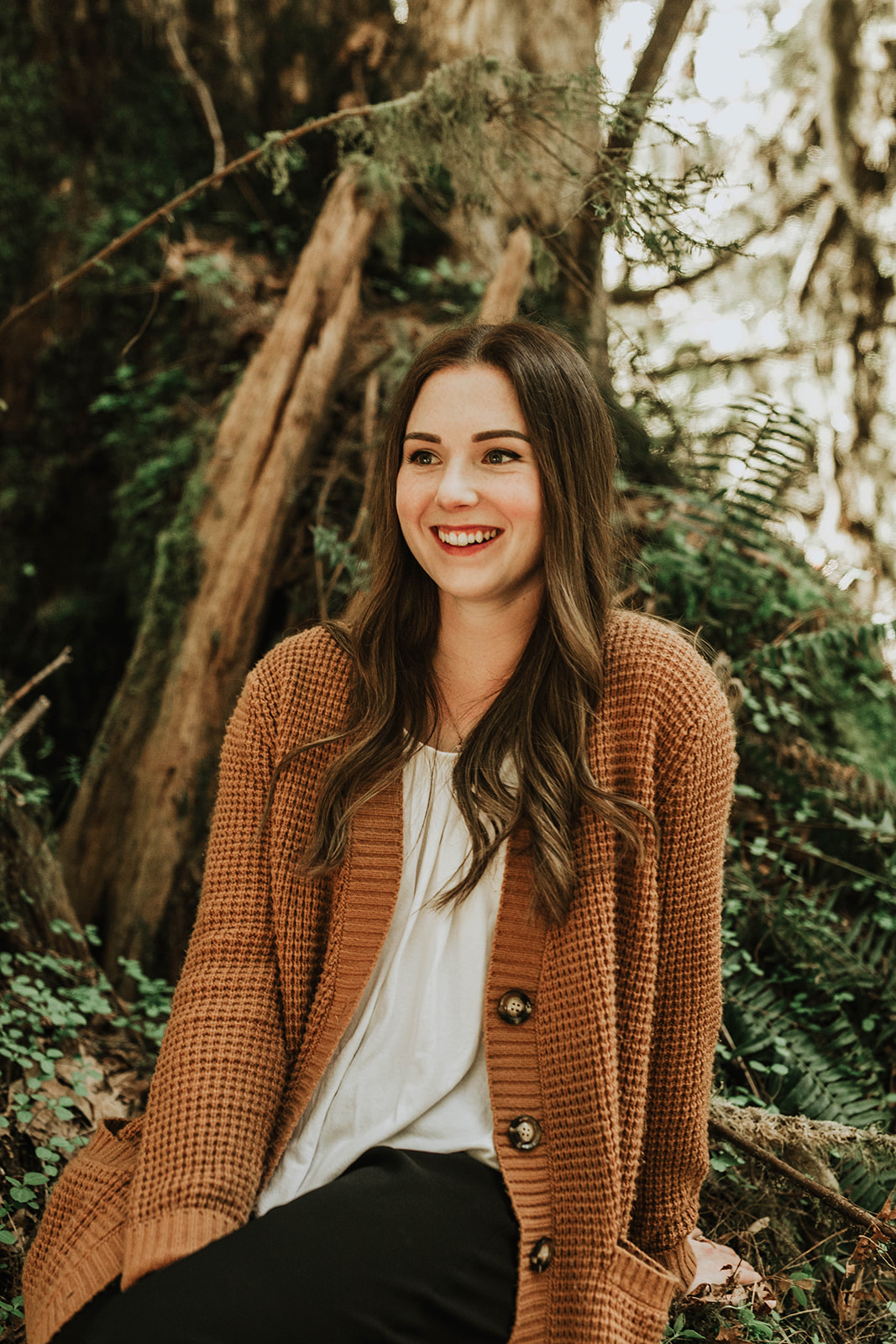 pretty girl smiling in forest