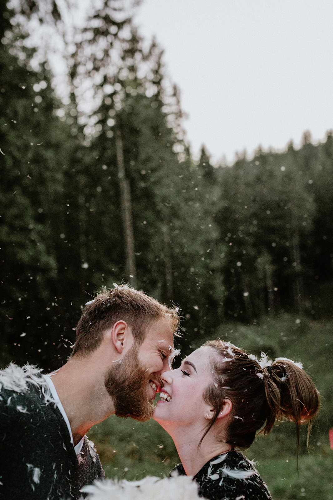 wedding portrait engagement pillow fight