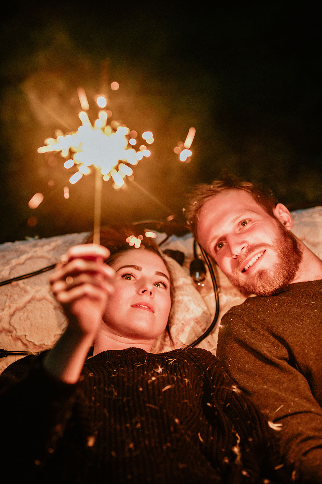 moody evening engagement session sparklers