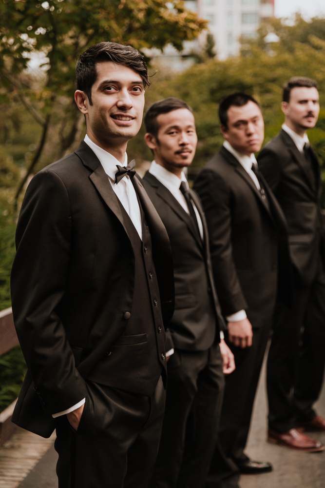 groomsmen smiling