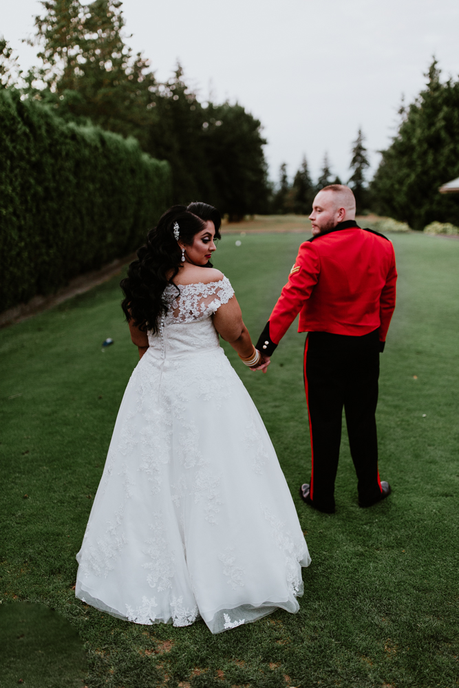 bride and groom at golf course