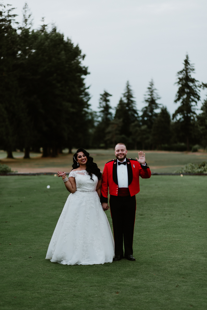 happy bride and groom at golf course