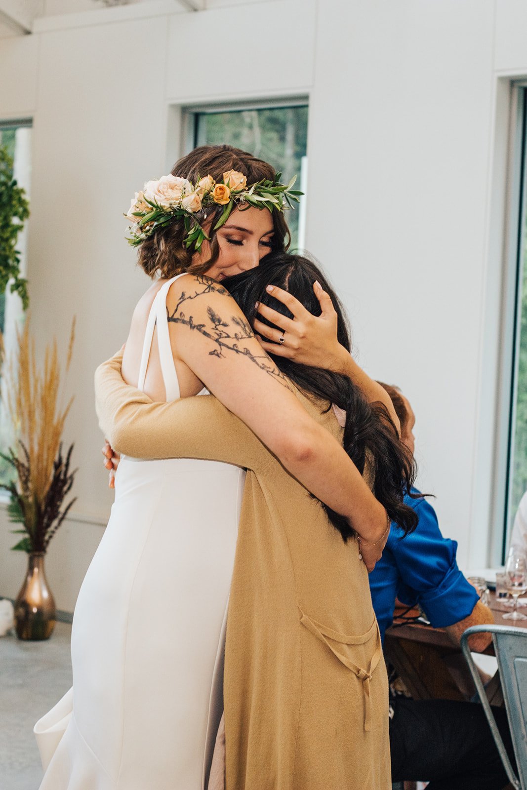 wedding hugs photographer.jpg