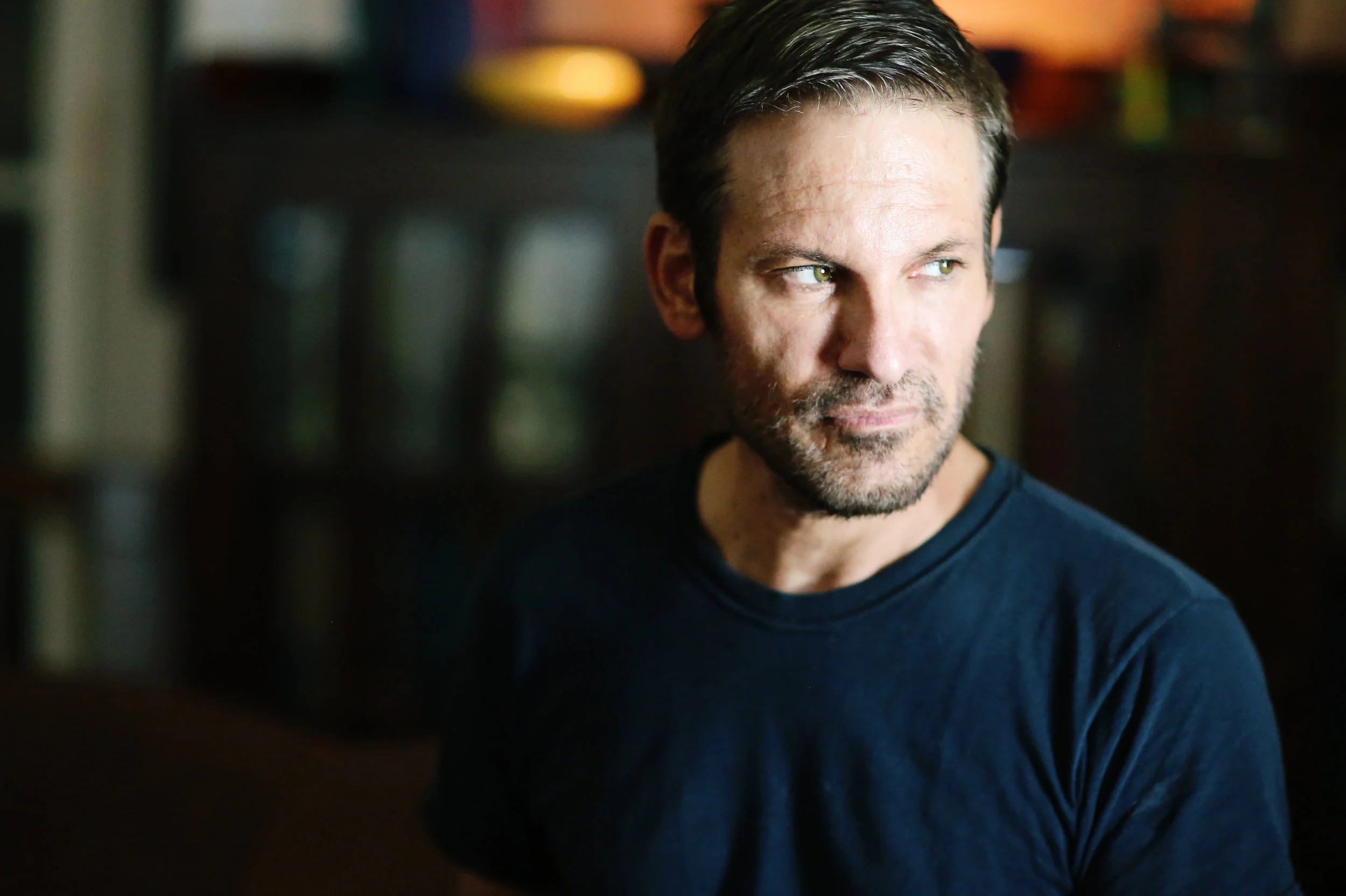 Fine art image of a man. lighting is organic.