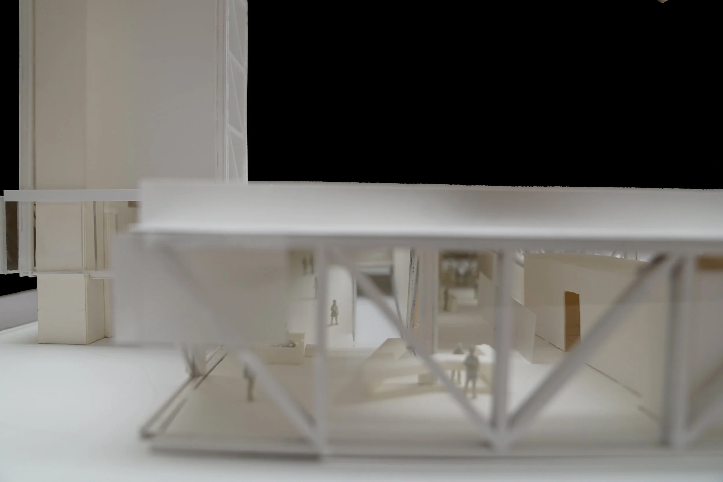  Program becomes divided between each ribbon, and connection between program is done by creating negative spaces based on the structure in the walls and floors.  