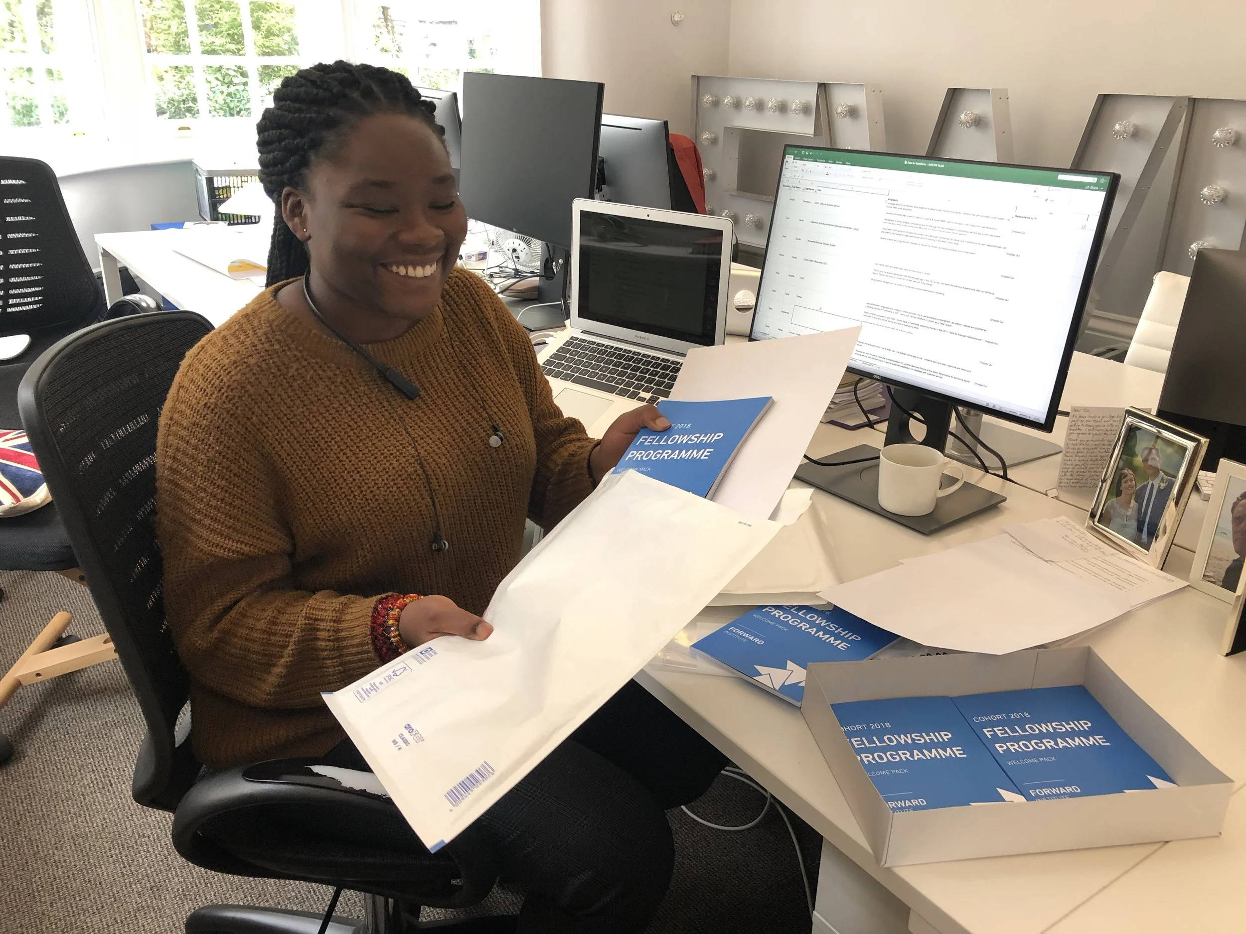 Tolu putting together welcome packs 