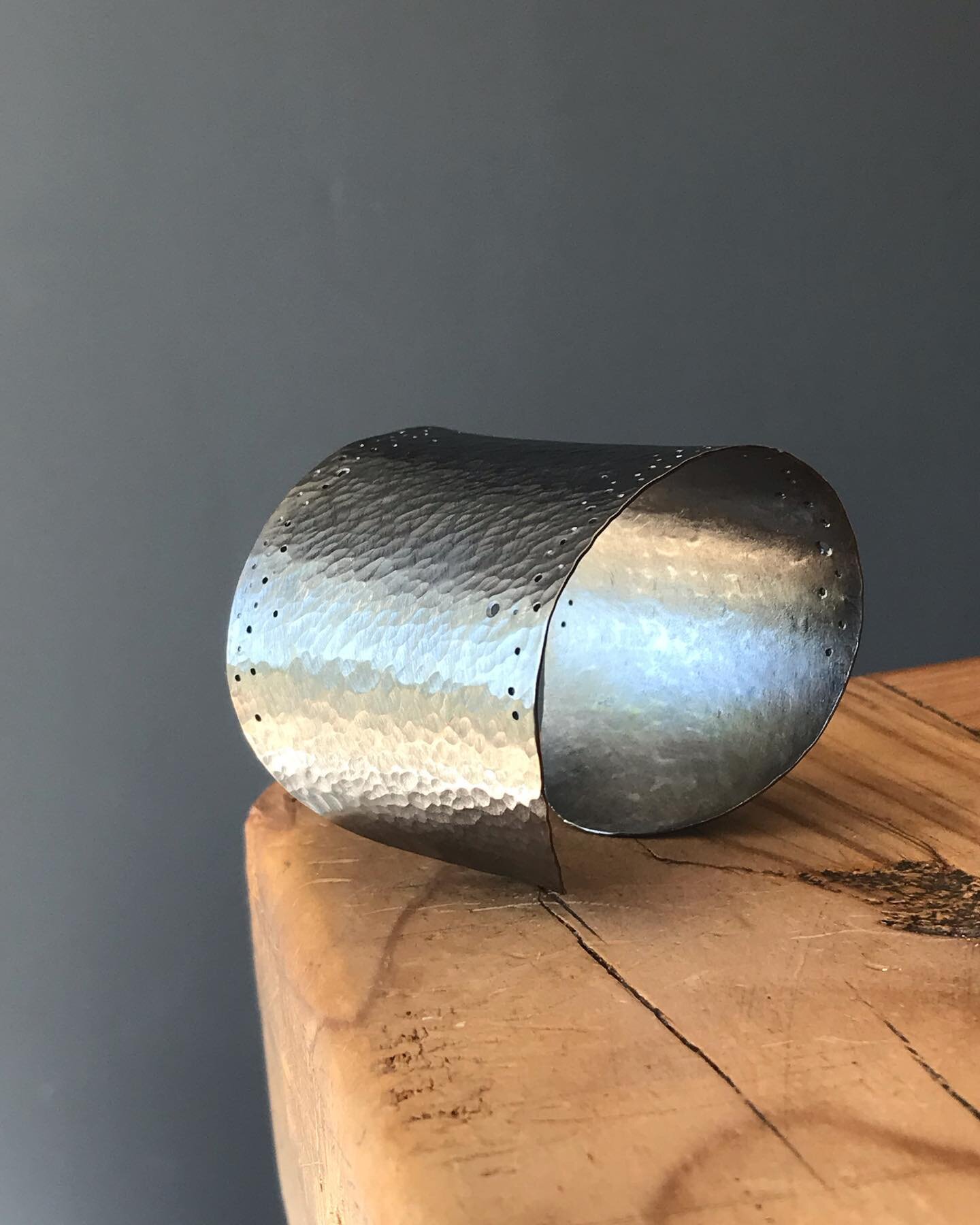 I do like doing something a bit different and this was made last week as a special order for a customer. A 2 inch wide, silver cuff. All carefully hammered with dotty edgings. Not heavy, but comfortable and looks really great shimmering in the sun. I