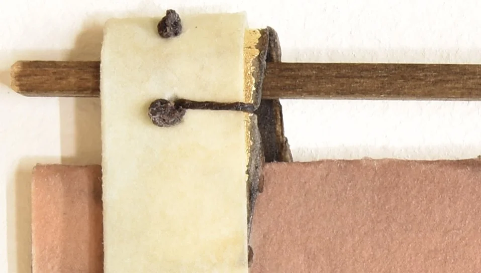 stitched hinge + wood.jpg