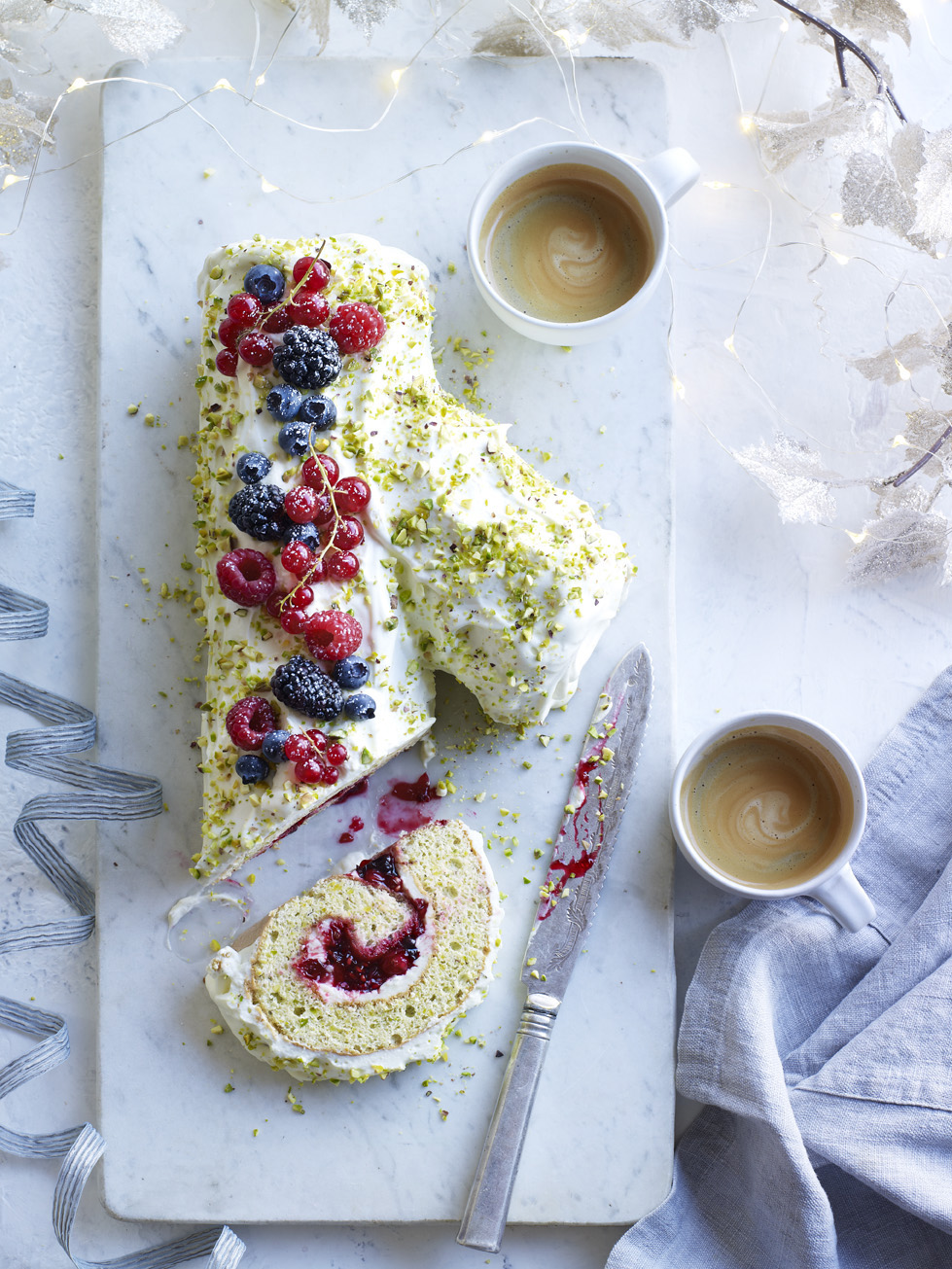 White Chocolate Pistachio Yule Log Photograph Kate Whitaker Prop Styling Olivia Wardle