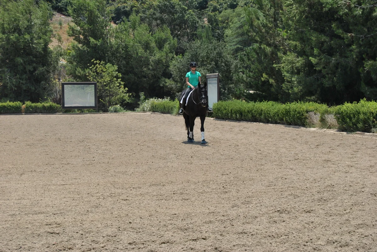 Riding in the West Dressage Arena.