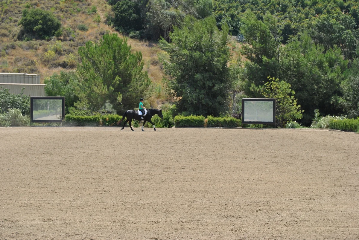 Riding in the West Dressage Arena.