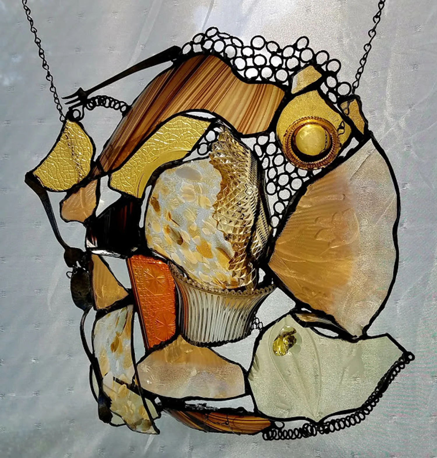 MANY SHADES OF AMBER ~ 21"X17" Repurposed glass and metal