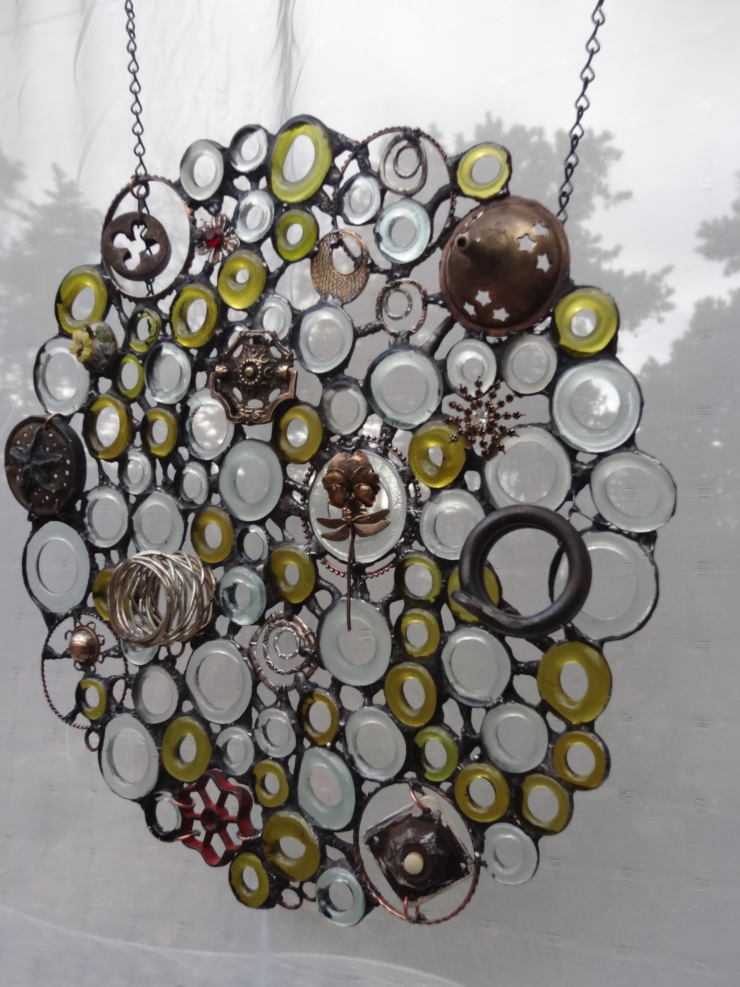 HUNDREDS-ENDLESS CIRCLE SERIES ~ 18"X17" Recycled glass and metals 