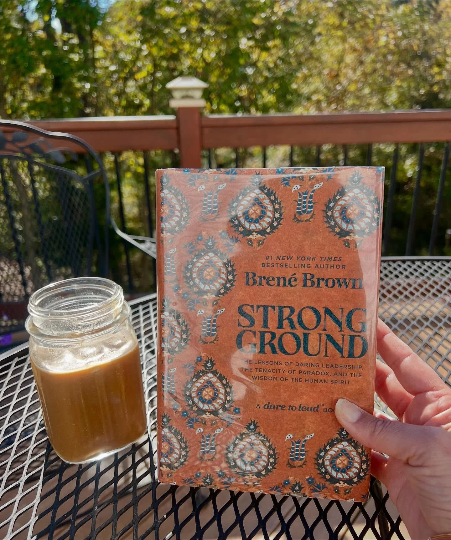 Cold brew and al fresco reading in late October, I&rsquo;ll take it. It&rsquo;s been one of the most consistently warm falls in Michigan since we moved here and I&rsquo;m loving it. And Bren&eacute; Brown is a long time favorite and as usual, she doe