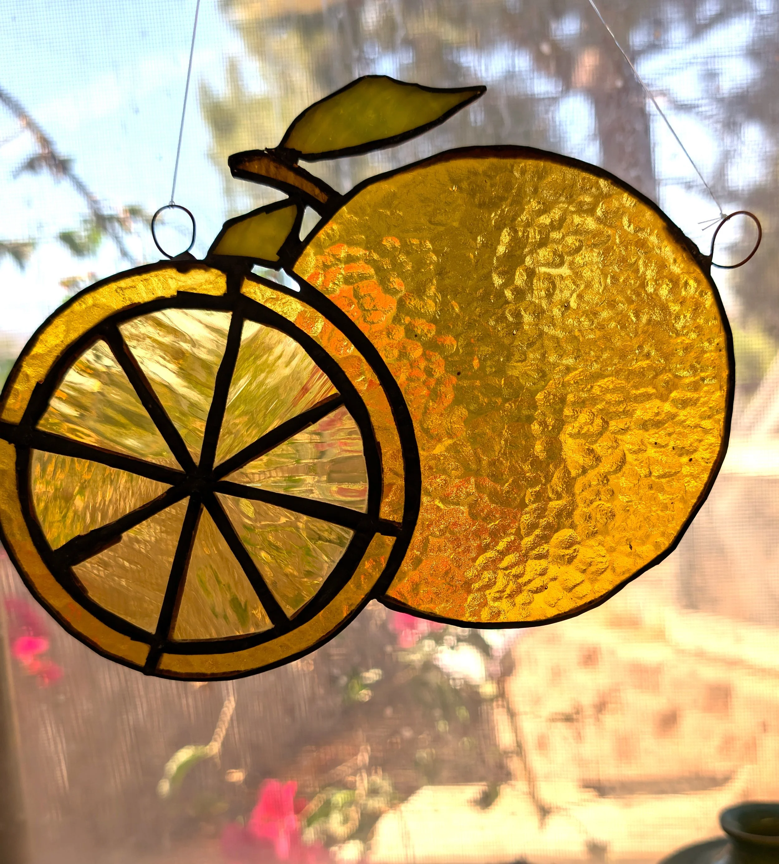 The Riverside Orange Stained Glass Suncatcher