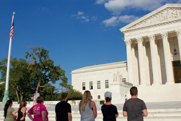 Team members with Bound4LIFE pray for wisdom and justice at the Supreme Court (Photo: Josh Shepherd)