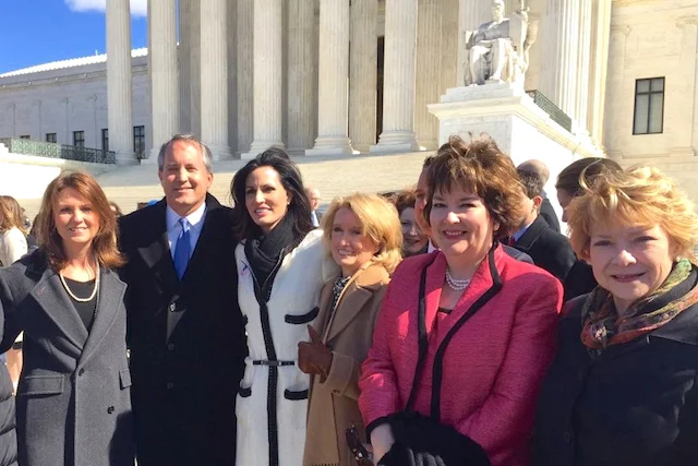 Outside the Supreme Court on March 2, Texas Attorney General Ken Paxton stands with State Rep. Jodie Laubenberg (center) and other leaders (Photo: Office of Ken Paxton / Twitter )
