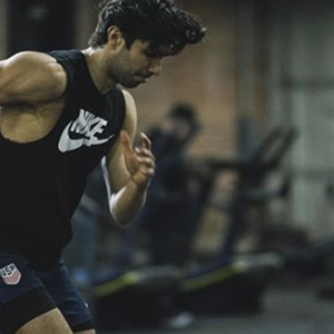  Akin Akman Instagram running in black Nike shirt 