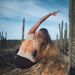  Yoga Girl Instagram posing in desert with cacti 