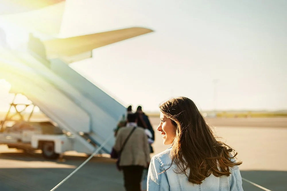 Woman-walking-towards-plane.jpg