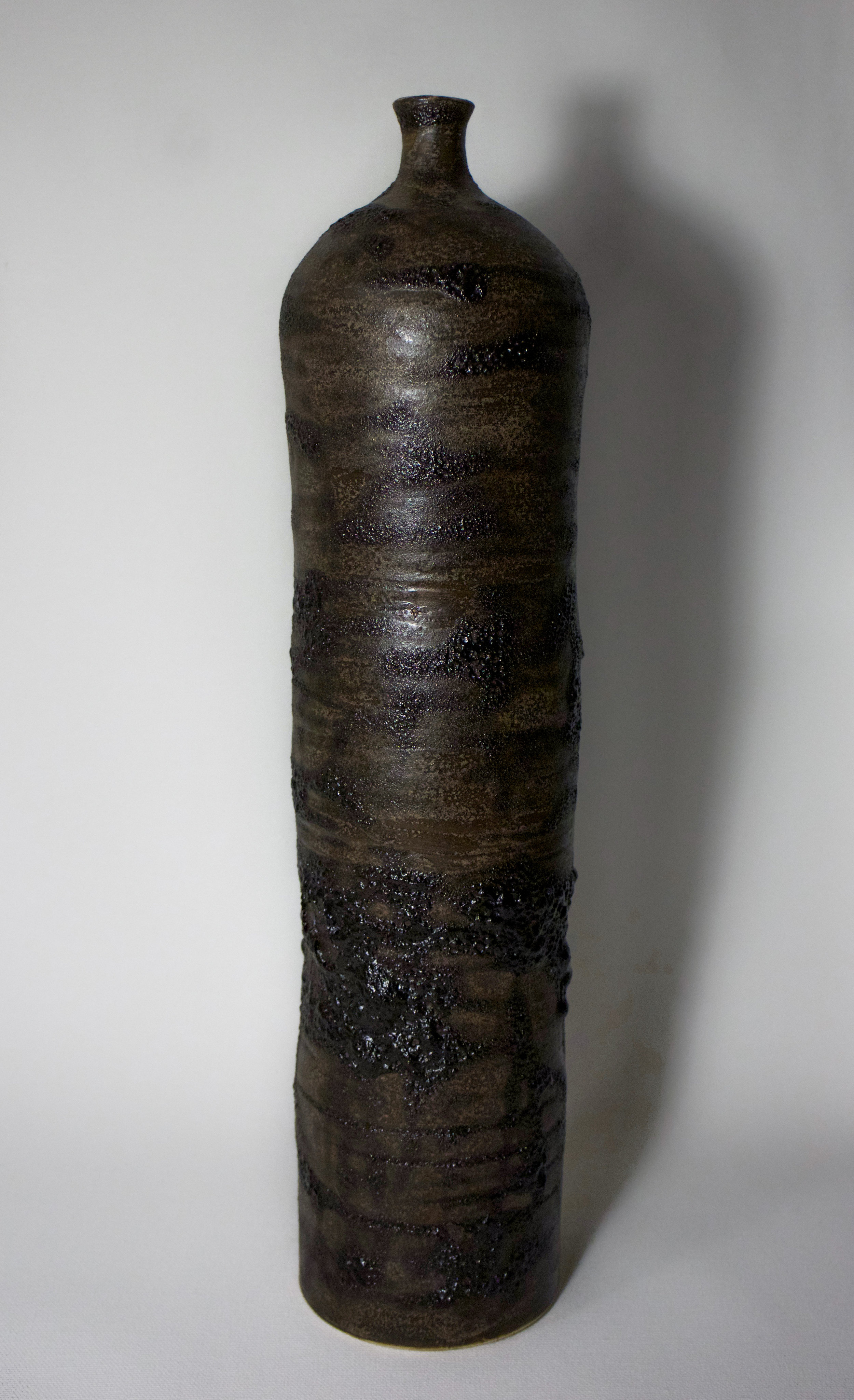 Porcelain Bottles in Darkmoon Lava Glaze White Interior