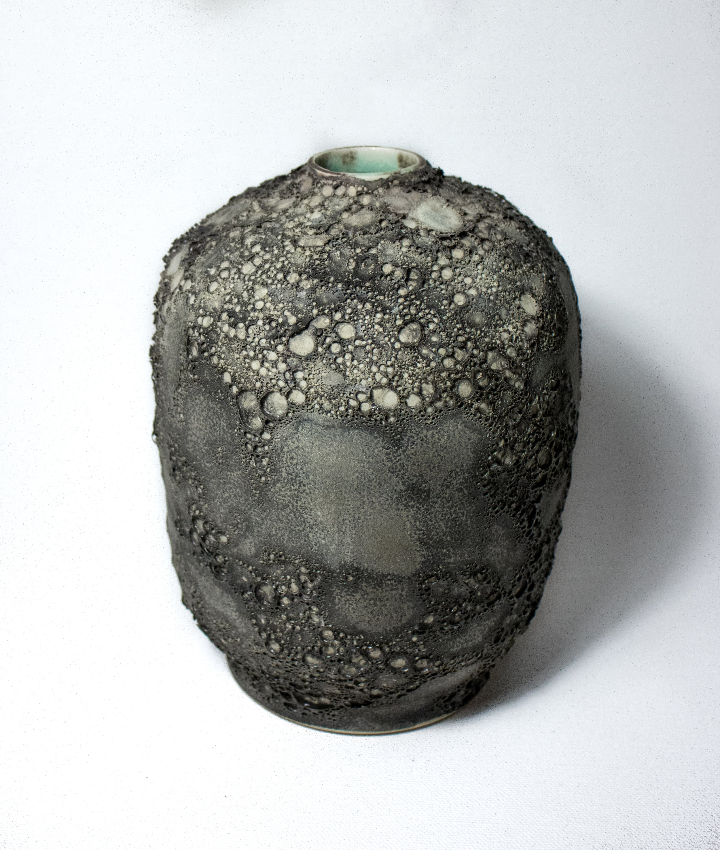 Porcelain Vessel in mars Lava Exterior Glaze Frozen Aqua Interior