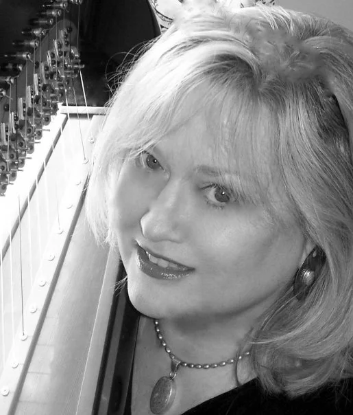 Carol_BW_AtHarp_2009.jpg
